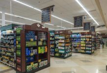 Recall Shock Hits Grocery Stores: Hidden Ingredient Interior view of a grocery store aisle with shelves of food and beverages