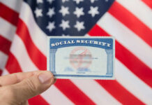 Social Security Doomed? Is THIS the Answer? Hand holding social security card, American flag background.