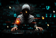 Hacker wearing a hoodie with digital codes overlaying.