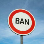 VIDEO: Central Park Death Sparks Ban Fight Sign reading BAN against blue sky background