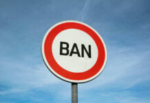 VIDEO: Central Park Death Sparks Ban Fight Sign reading BAN against blue sky background