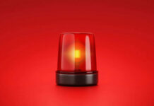 AIPAC Targeted — The Chilling Near-Miss Red emergency light on red background
