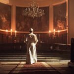 Cruises, Casinos — Church Cash? A religious figure standing in a church with candlelight illuminating the space