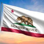 California Fast-Food Bloodbath Begins California state flag waving against a sunset sky