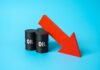 Oil Plunge Aftershock — But What’s Missing? Three black oil barrels with the word 'OIL' and a red downward arrow
