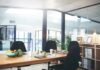 Shareholder Revolt: Delaware Dumped Modern conference room with wooden table and black chairs