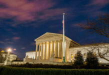 Kavanaugh Drops Bomb On Sports The United States Supreme Court building at dusk.