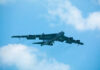 Missile Drain Hits Hard — What’s Left? Large military aircraft flying with landing gear down