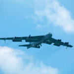 Missile Drain Hits Hard — What’s Left? Large military aircraft flying with landing gear down