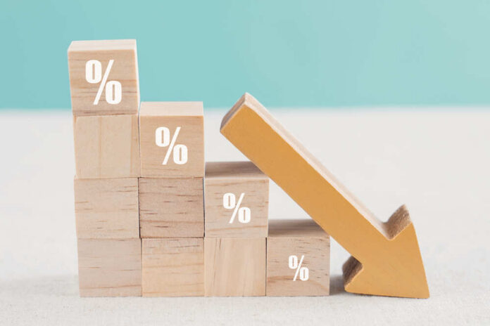 Wooden,Blocks,With,Percentage,Sign,And,Down,Arrow,,Financial,Recession Wooden blocks with percent signs and a downward arrow