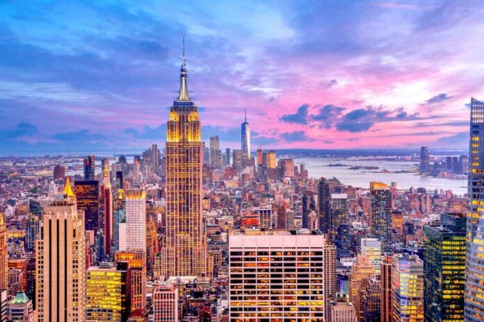 New,York,City,,Usa,-,06.07.2017:,Empire,State,Building Empire State Building amid New York City skyline at sunset