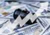Iran Clash Chokes World Oil – Prices Skyrocket AGAIN! An oil barrel placed on a background of dollar bills with an upward trend graph overlay