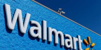 Walmart store sign on a blue wall