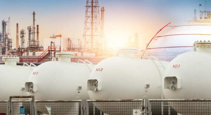 Industrial,Gas,Storage,Tank.,Lng,Or,Liquefied,Natural,Gas,Storage Gas storage tanks in an industrial facility during sunrise