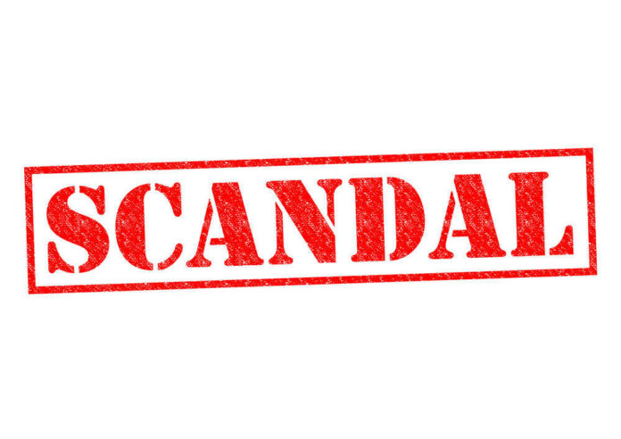 shutterstock_224824333 Red stamp with the word scandal