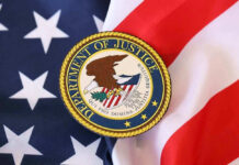 DOJ Clash: Judge Called It Vindictive Department of Justice seal on American flag.