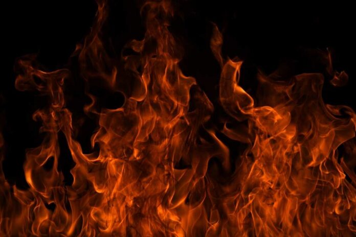 Fire,Flame,Motion,Pattern,Abstract,Texture.,Burning,Fire,,Flame,Overlay Close-up of vibrant flames against a black background