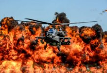 VIDEO: Apache Inferno Claims 2 Soldiers Military Apache helicopter flying through a cloud of smoke