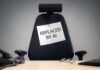 AI Blamed Again — Who’s Next? Empty office chair with a sign pinned to the backrest