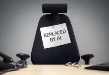 Empty office chair with a sign pinned to the backrest