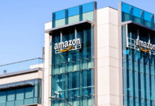 Amazon Pay Hike Hype – Huge Catch Inside Exterior view of an Amazon corporate building with a glass facade