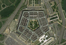 Pentagon Alarm: Missile Cupboards Thin Aerial view of the Pentagon building surrounded by roads and parking lots