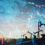 OPEC’s Quiet Move, Wild Price Slide Oil pumps and financial charts against world map