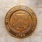 Trump Order Slams ‘Dead Money’ Spigot Department of the Treasury seal on stone wall