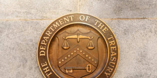 Department of the Treasury seal on stone wall