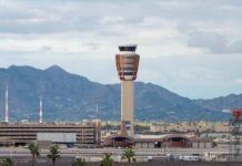 TSA’s New Order Sparks Uproar Airport control tower with mountains in the background