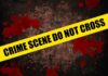 Coworker Opens Fire – 3 Down Yellow caution tape reading 'CRIME SCENE DO NOT CROSS' over a dark, blood-splattered background