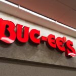 Exterior view of a Buc-ee's convenience store with cars parked outside