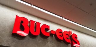 Exterior view of a Buc-ee's convenience store with cars parked outside