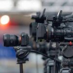 DOJ U-Turn Shreds Vandalism Case Professional video cameras on tripods