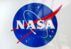 NASA logo with blue sphere and red swoosh