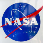 NASA logo with blue sphere and red swoosh