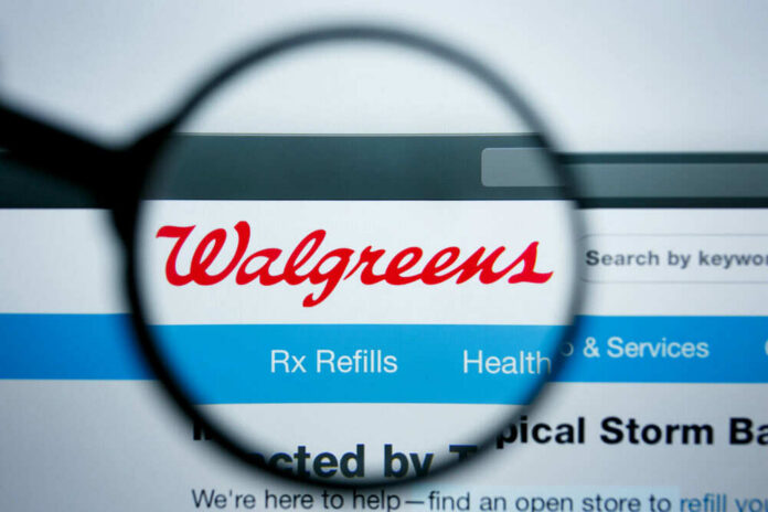 shutterstock_1450971797 Magnifying glass highlighting Walgreens website header logo