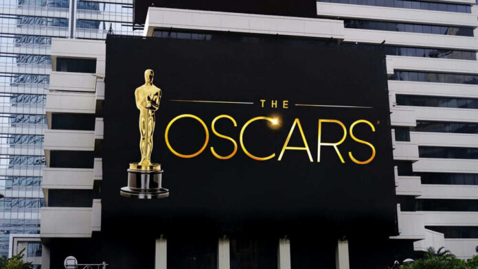 shutterstock_2251385311 Oscars billboard on a city building exterior wall
