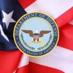 Pentagon Livestream Plan Sparks Doubt Department of Defense emblem on an American flag background