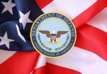Department of Defense emblem on an American flag background