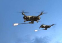 Eleven Vanish In Drone Ambush Two military drones firing projectiles in the sky