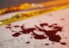 Balcony Horror: Mother, Baby Plunge (Video) Blood droplets on pavement near yellow caution tape