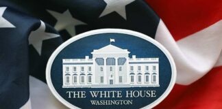 White House emblem on an American flag background